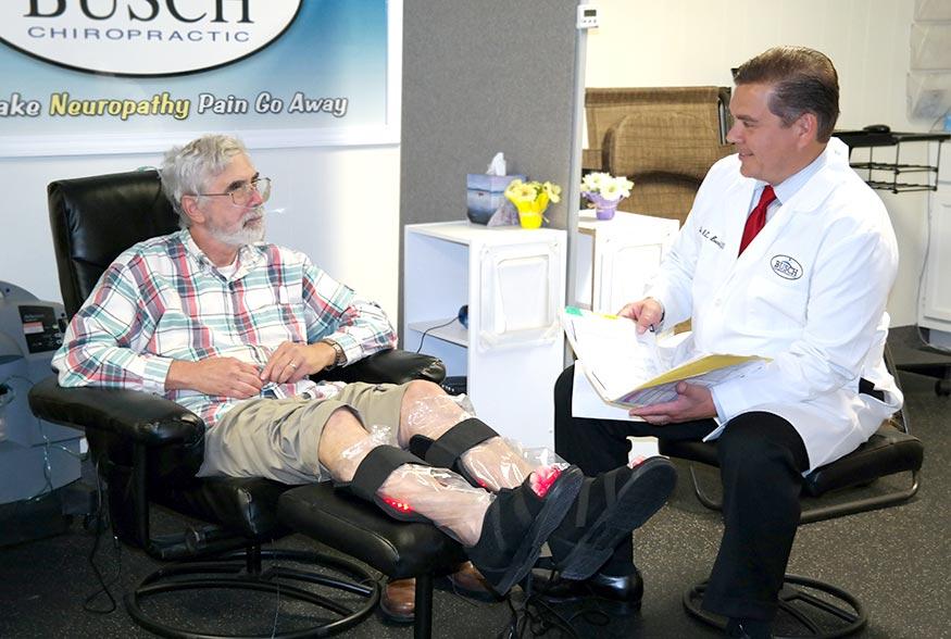 Dr. Busch caring for a patient at the Busch Chiropractic Pain Center