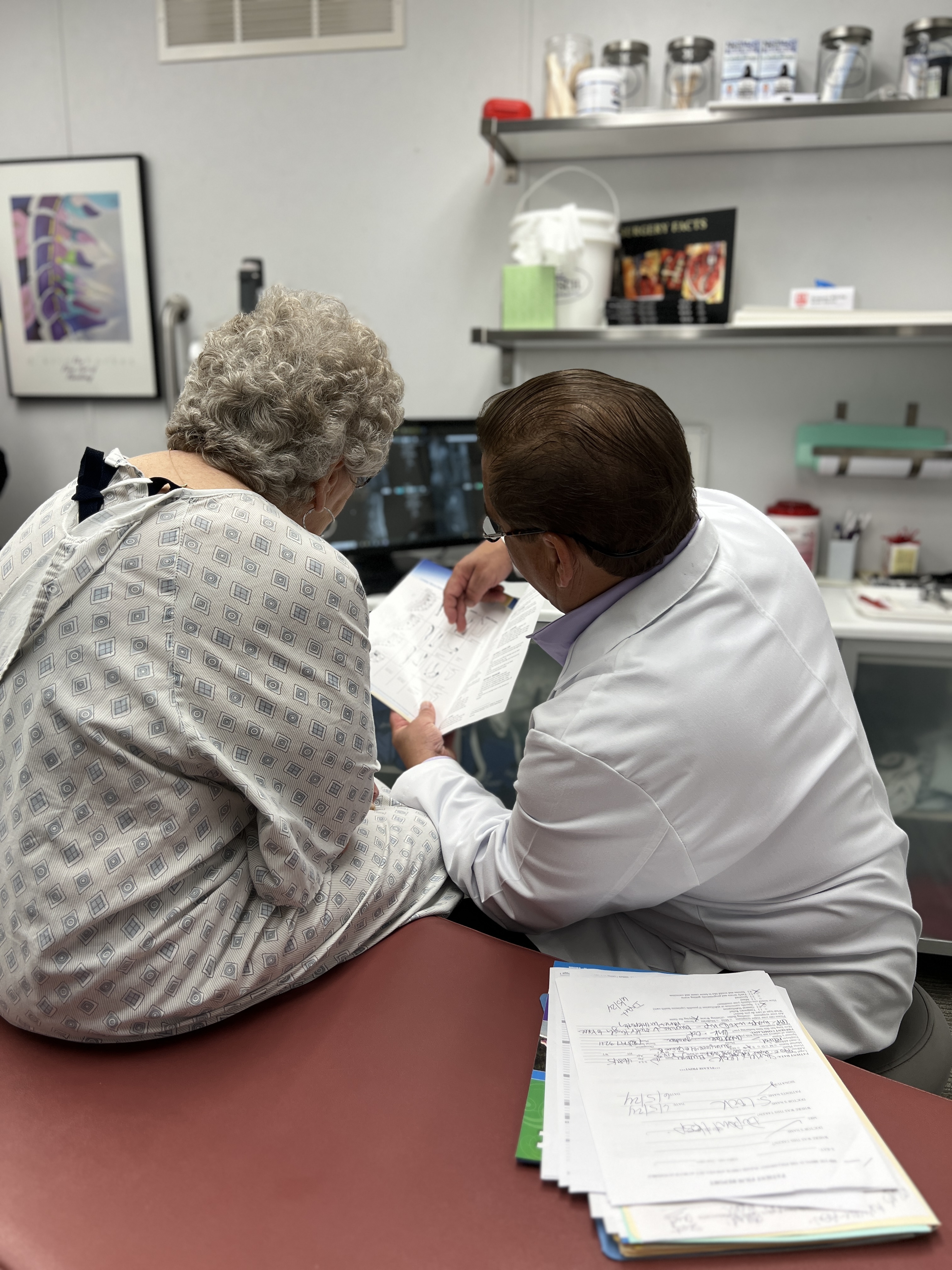 Dr. Busch working with a chiropractic patient